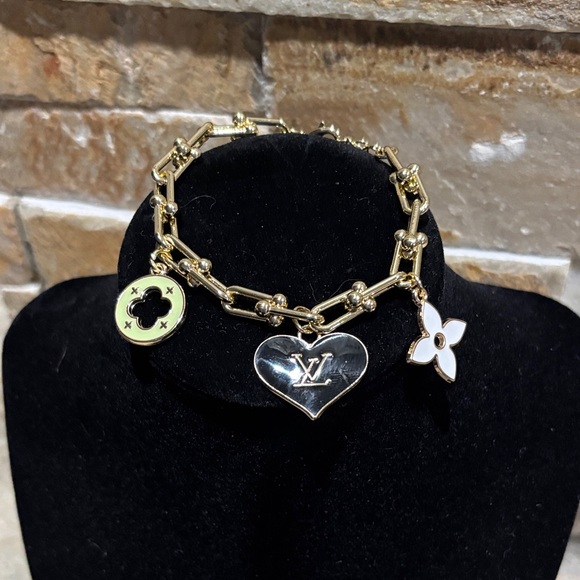 Gold Charm Bracelet with LV Heart and Flower Accents - Picture 1 of 4